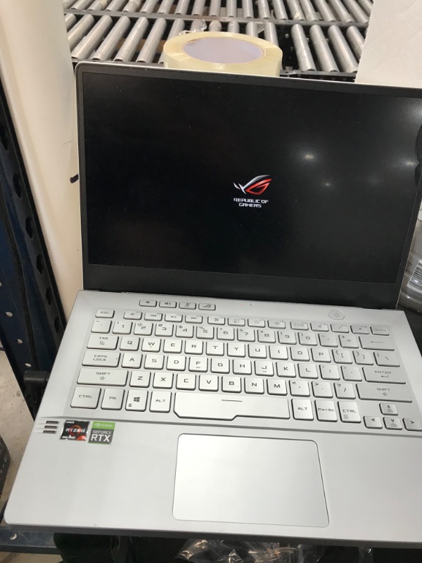 Photo 2 of PARTS ONLY NO BOOTABLE DEVICE NEEDS PROFESSIONAL REPAIR 
ASUS - ROG Zephyrus G14 14" Gaming Laptop - AMD Ryzen 9 - 16GB Memory - NVIDIA GeForce RTX 2060 - 1TB SSD - Moonlight White