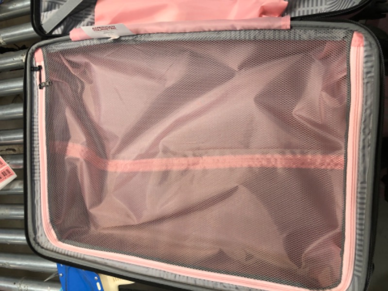 Photo 6 of **MINOR SHIPPING DAMAGE**American Tourister Stratum XLT Expandable Hardside Luggage with Spinner Wheels, Pink Blush, Checked-Large 28-Inch Checked-Large 28-Inch Pink Blush