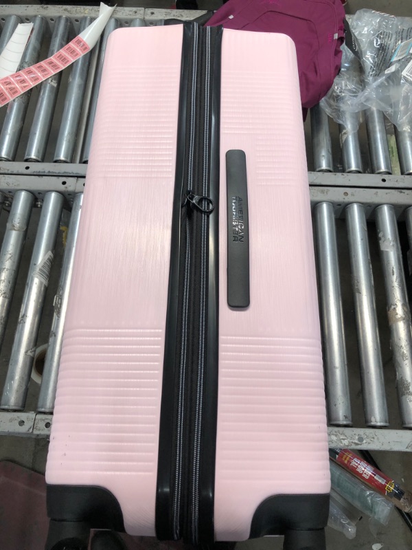 Photo 3 of **MINOR SHIPPING DAMAGE**American Tourister Stratum XLT Expandable Hardside Luggage with Spinner Wheels, Pink Blush, Checked-Large 28-Inch Checked-Large 28-Inch Pink Blush