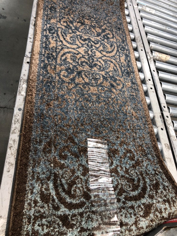 Photo 1 of 1'8"x5' brown/blue rug (Unknown brand/style) 