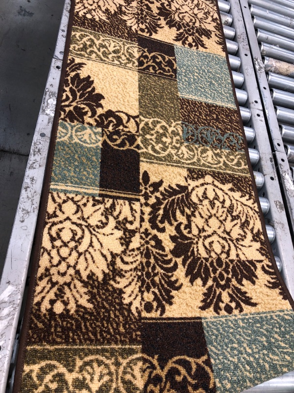 Photo 1 of 1'8"x5'10.5" brown rug (Unknown brand/style) 
