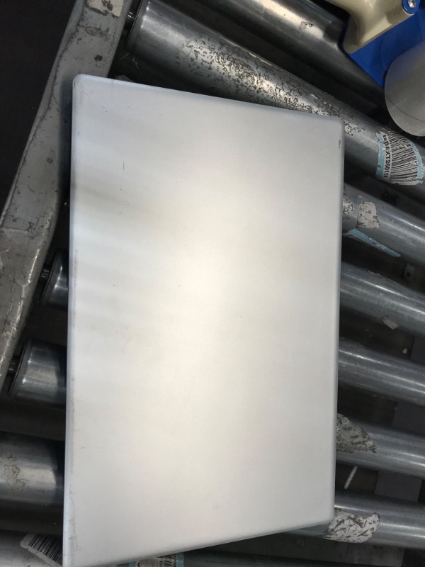 Photo 1 of PARTS ONLY DMAGED SCREEN MISSING CHARGER 
unknown make and model 
silver laptop 