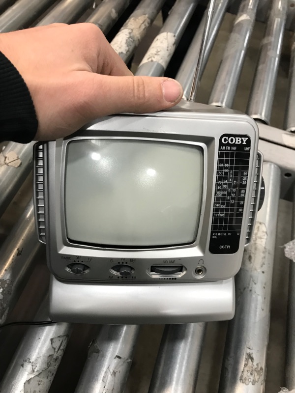Photo 2 of (SEE NOTES ABOUT FUNCTIONALITY)
Coby CX-TV1 5" Black-and-White TV with AM/FM Tuner
