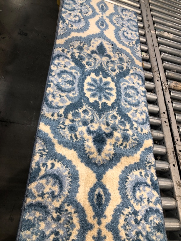 Photo 1 of 1'8"x4'8" white/blue runner rug 