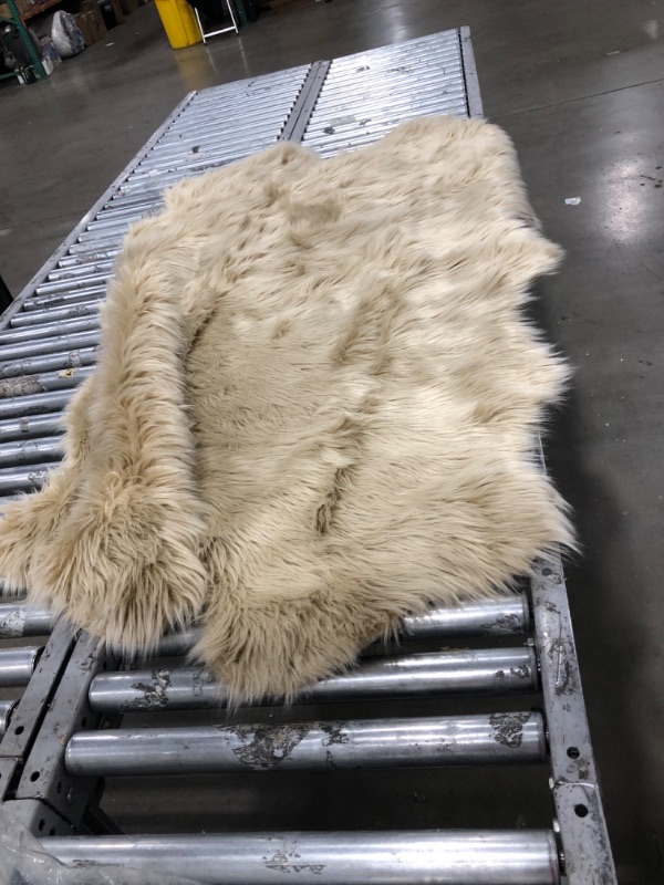 Photo 2 of Nouvelle Legende® Faux Fur Sheepskin Premium Rug Quattro (43 in. X 73 in.) Tan
