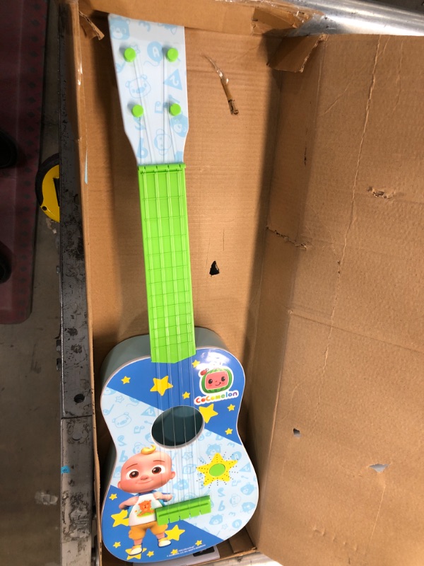 Photo 3 of CoComelon Musical Guitar by First Act, 23.5” Kids Guitar - Plays Clips of The ‘Finger Family’ Song - Musical Instruments for Kids, Toddlers, and Preschoolers