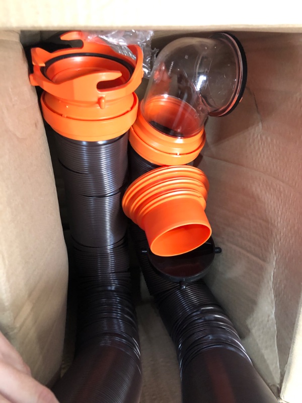 Photo 1 of Camco RhinoFLEX RV Sewer Hose Kit with Swivel Transparent Elbow and 4-in-1 Dump Station Fitting, Brown, 15 Feet (39770) 15ft Sewer Hose Kit Frustration-Free Packaging