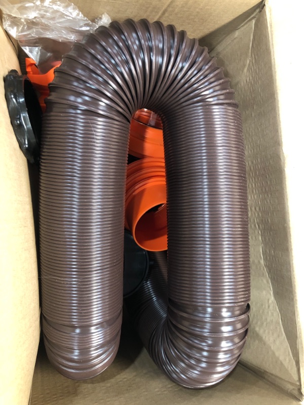 Photo 1 of Camco RhinoFLEX RV Sewer Hose Kit with Swivel Transparent Elbow and 4-in-1 Dump Station Fitting, Brown, 15 Feet (39770) 15ft Sewer Hose Kit Frustration-Free Packaging