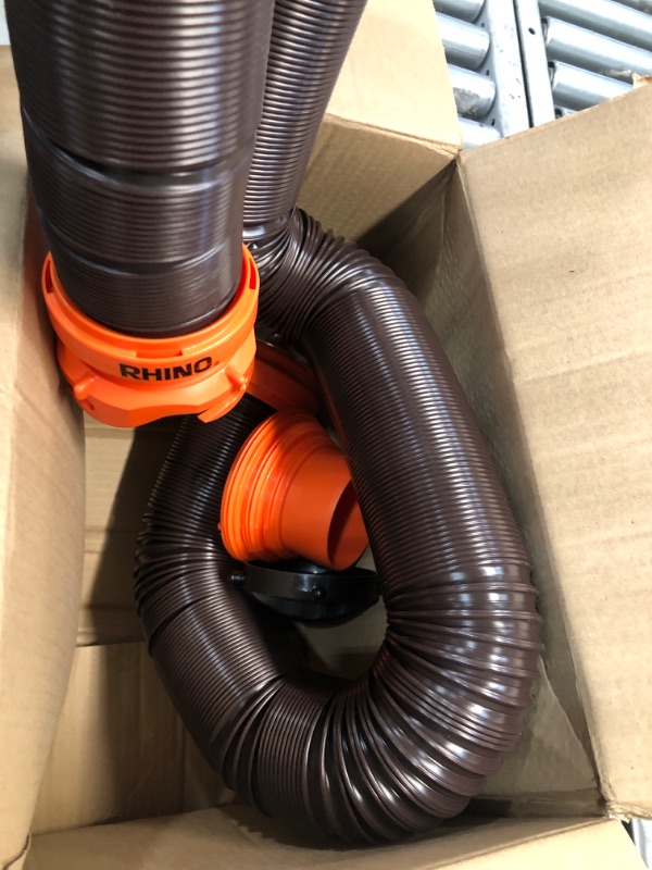 Photo 1 of Camco RhinoFLEX RV Sewer Hose Kit with Swivel Transparent Elbow and 4-in-1 Dump Station Fitting, Brown, 15 Feet (39770) 15ft Sewer Hose Kit Frustration-Free Packaging