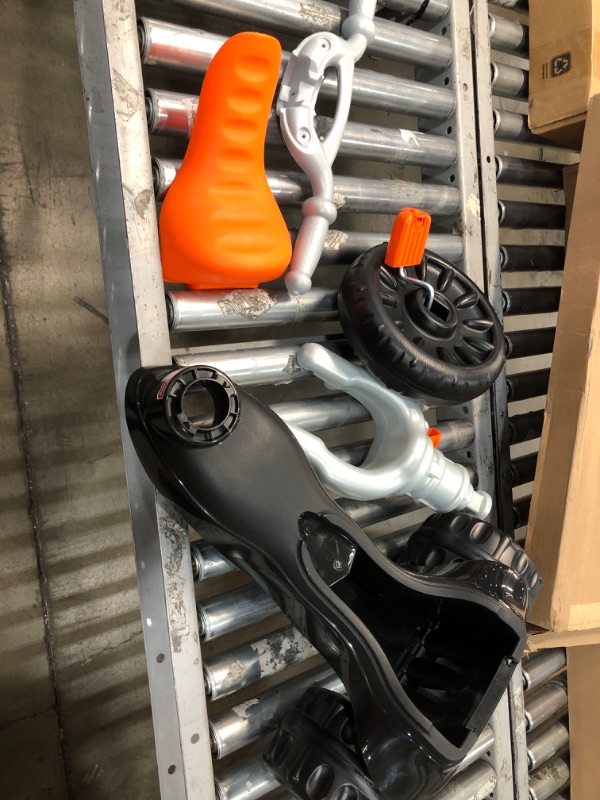 Photo 1 of **USED** Fisher-Price Harley-Davidson Tricycle with Handlebar Grips and Storage Area, Multi-Terrain Tires, Tough Trike [Amazon Exclusive] Harley - Davidson