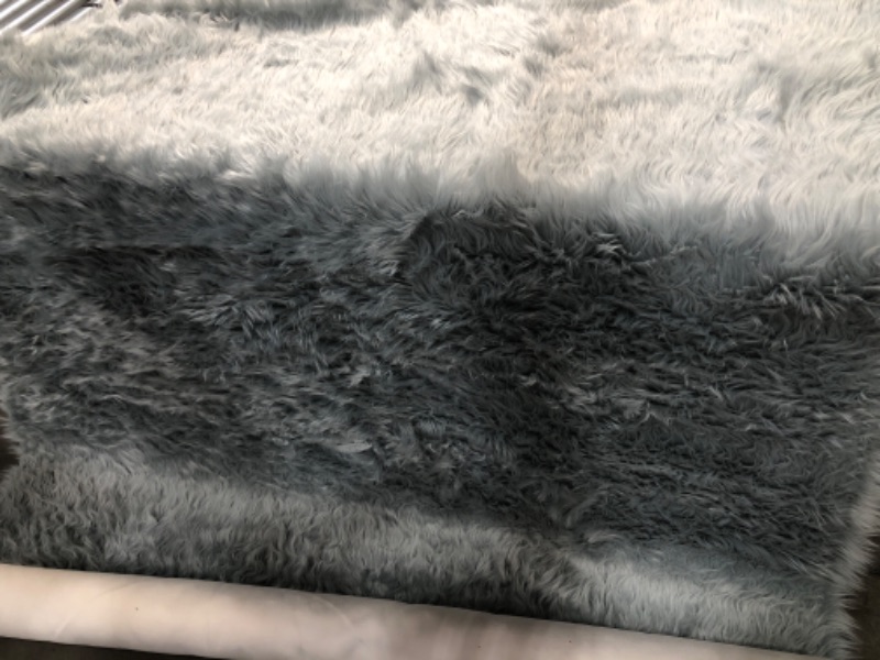 Photo 1 of **USED** Light Greyish Blue Rug 5' x 7' 