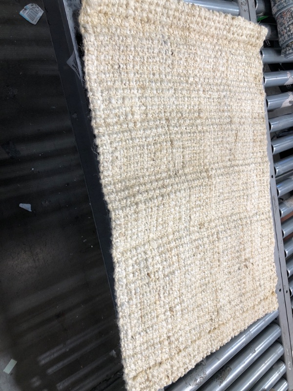 Photo 1 of **USED** 3'x2' Tan Rug