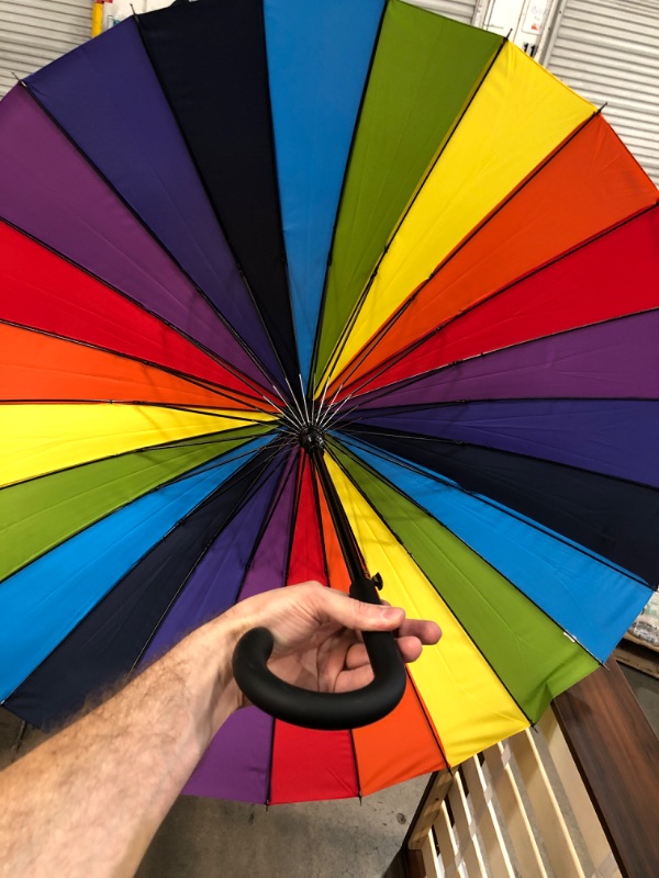 Photo 3 of **USED** totes Large Eco Auto-Open 24 Rib Stick Umbrella with a Classic J Hook Curved Handle and water repellant One Size Bright Rainbow