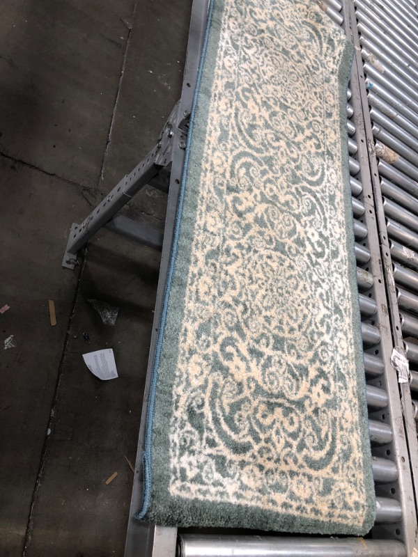 Photo 1 of **USED/DAMAGED** 60"x20" Green Rug