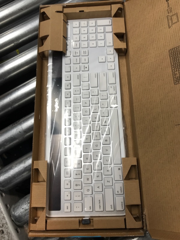 Photo 2 of **PARTS ONLY** WONT TURN ON** Logitech K750 Wireless Solar Keyboard for Mac — Solar Recharging, Mac-Friendly Keyboard, 2.4GHz Wireless - Silver