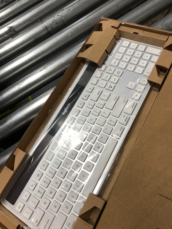 Photo 3 of **PARTS ONLY** WONT TURN ON** Logitech K750 Wireless Solar Keyboard for Mac — Solar Recharging, Mac-Friendly Keyboard, 2.4GHz Wireless - Silver