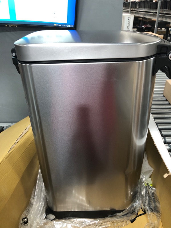 Photo 1 of Used / dented *** Simplehuman 35 Liter, 40 lb / 18.1 kg X-Large Pet Food Storage Container, Brushed Stainless Steel for Dog Food, Cat Food, and Bird Feed X-Large Storage