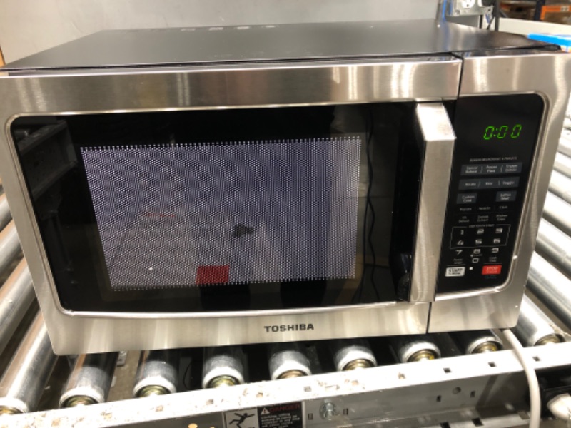 Photo 2 of TOSHIBA EM131A5C-SS Countertop Microwave Oven, 1.2 Cu Ft with 12.4" Turntable, Smart Humidity Sensor with 12 Auto Menus, Mute Function & ECO Mode, Easy Clean Interior, Stainless Steel & 1100W Silver Microwave Oven