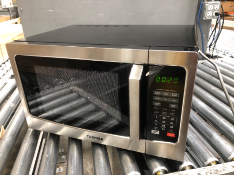 Photo 1 of NON FUNCTIONING START POWER PANEL**TOSHIBA EM131A5C-SS Countertop Microwave Oven, 1.2 Cu Ft with 12.4" Turntable, Smart Humidity Sensor with 12 Auto Menus, Mute Function & ECO Mode, Easy Clean Interior, Stainless Steel & 1100W Silver Microwave Oven