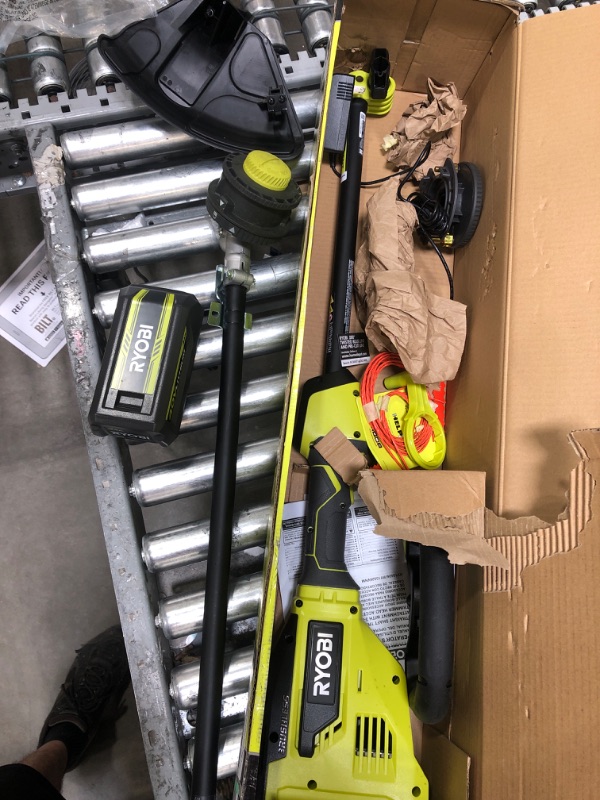 Photo 2 of RYOBI 40-Volt Lithium-Ion Brushless Electric Cordless Attachment Capable String Trimmer 4.0 Ah Battery and Charger Included