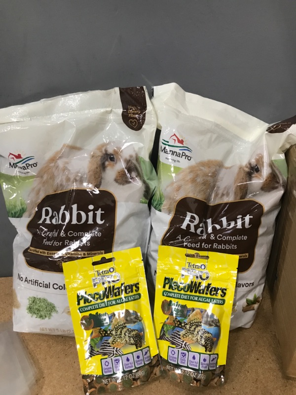 Photo 1 of 2 bags of rabbit feed ( manufacturer date: 6/22)
2 pack fish food exp date:12/24