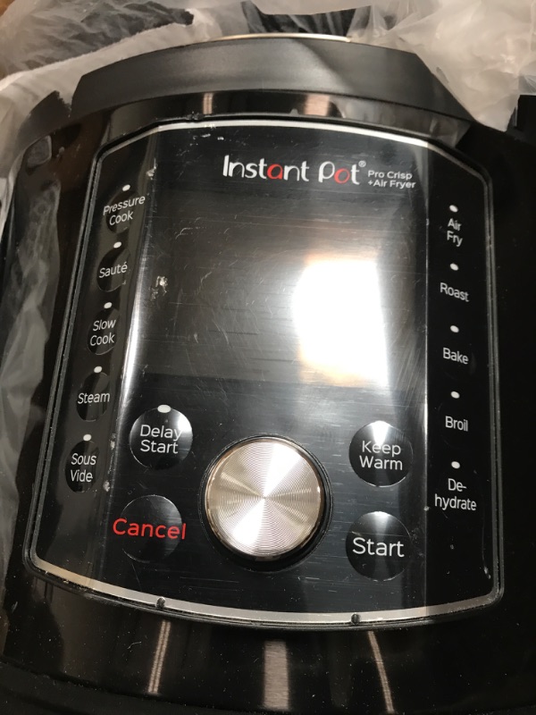 Photo 2 of *MAJOR DENTS SEE NOTES*
Instant Pot Pro Crisp 11-in-1 Air Fryer and Electric Pressure Cooker Combo Black)