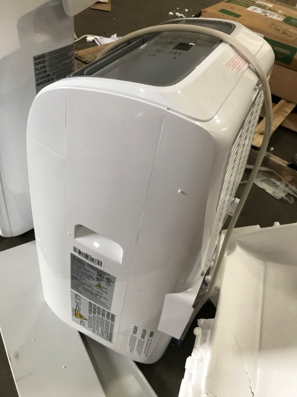 Photo 1 of BLACK+DECKER Air Conditioner, 14,000 BTU Air Conditioner Portable for Room up to 700 Sq. Ft. with Remote Control, White
