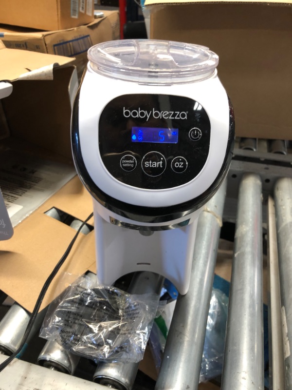 Photo 3 of Baby Brezza Formula Pro Mini Baby Formula Maker – Small Baby Formula Mixer Machine Fits Small Spaces and is Portable for Travel– Bottle Makers Makes The Perfect Bottle for Your Infant On The Go Formula Pro Mini Dispenser Machine