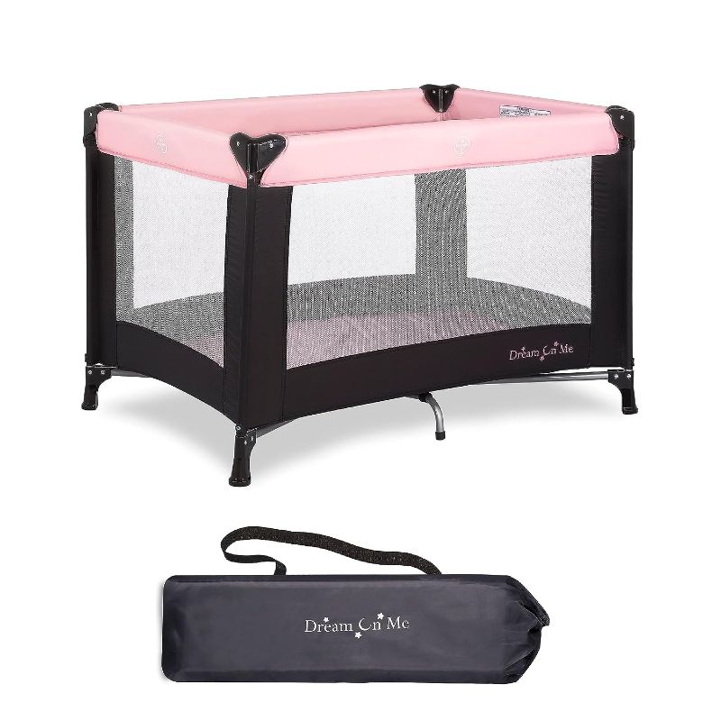 Photo 1 of Dream On Me Nest Portable Play Yard with Carry Bag and Shoulder Strap, Pink
