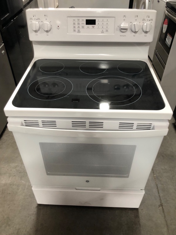 Photo 2 of GE 30 in. 5.3 cu. ft. Free-Standing Electric Range in White with Self Clean