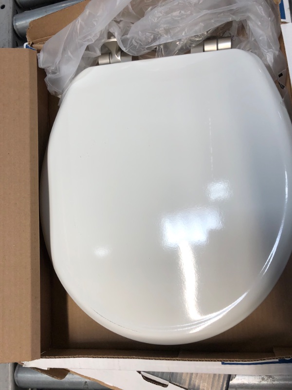 Photo 2 of * used * see images for damage *
Mansfield Wood White Round Soft Close Toilet Seat