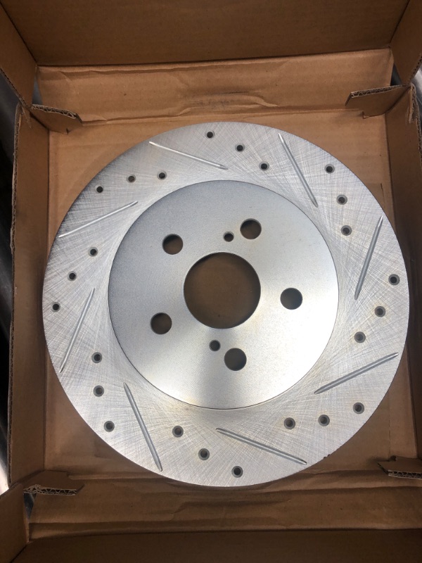 Photo 7 of Drilled and Slotted Silver Zinc Brake Rotor 631-75029L + Drilled and Slotted Silver Zinc Brake Rotor 631-75029R + Dynamic Friction 631-76087R + Dynamic Friction 631-76087L (full set of 4 rotors)