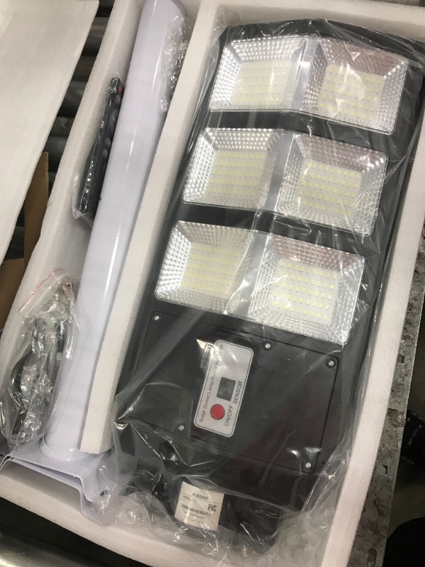 Photo 2 of A-ZONE 300W Solar Street Lights Outdoor Waterproof, 6500K 30000LM Outdoor LED Street Light Dusk to Dawn, LED Wide Angle Lamp with Motion Sensor and Remote Control, for Parking Lot, Yard, etc.