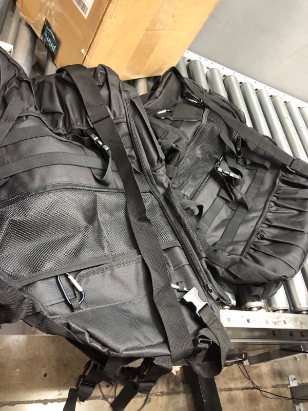 Photo 1 of 2 black bags