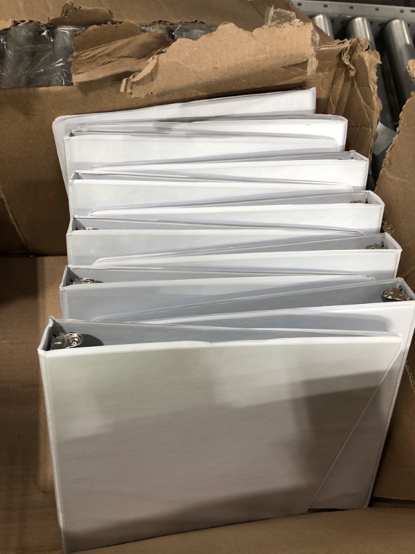 Photo 1 of 11 White binders 