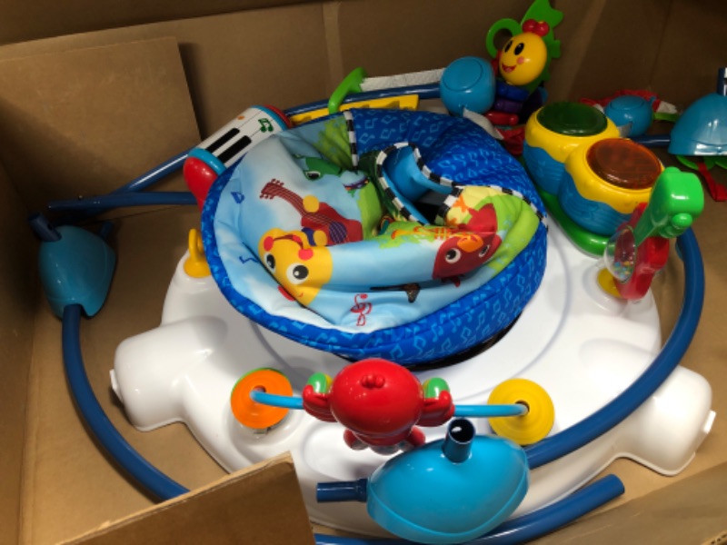 Photo 1 of Baby Einstein Neighborhood Symphony Activity Jumper Infant Entertainer with Lights and Melodies, Age 6 months +, Max weight 25 lbs., Unisex
