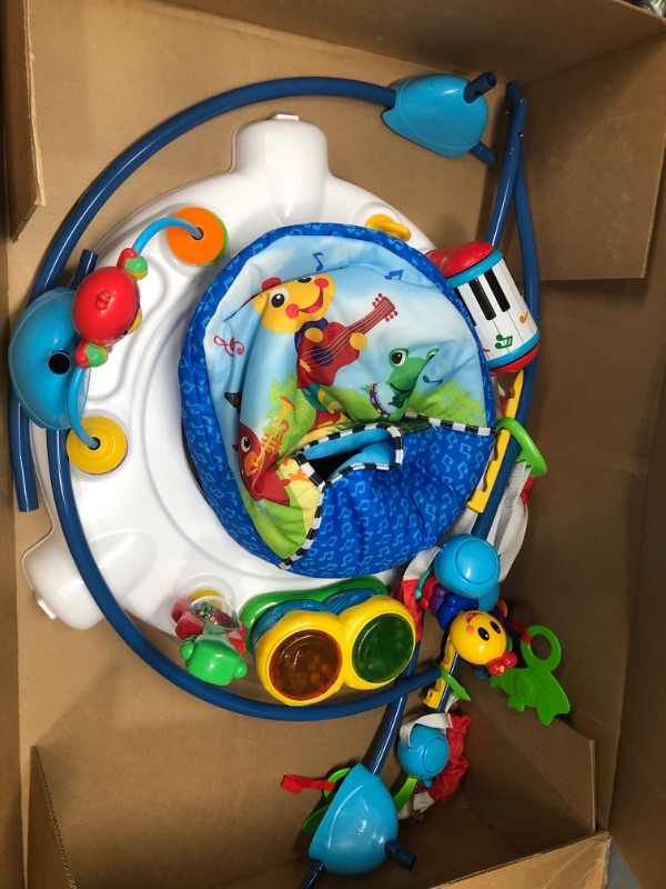 Photo 1 of Baby Einstein Neighborhood Symphony Activity Jumper Infant Entertainer with Lights and Melodies, Age 6 months +, Max weight 25 lbs., Unisex
