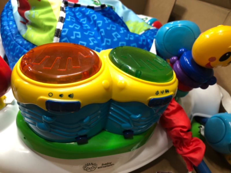 Photo 1 of Baby Einstein Neighborhood Symphony Activity Jumper Infant Entertainer with Lights and Melodies, Age 6 months +, Max weight 25 lbs., Unisex
