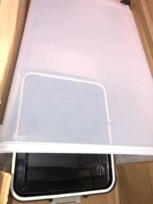 Photo 1 of clear office bin with lid