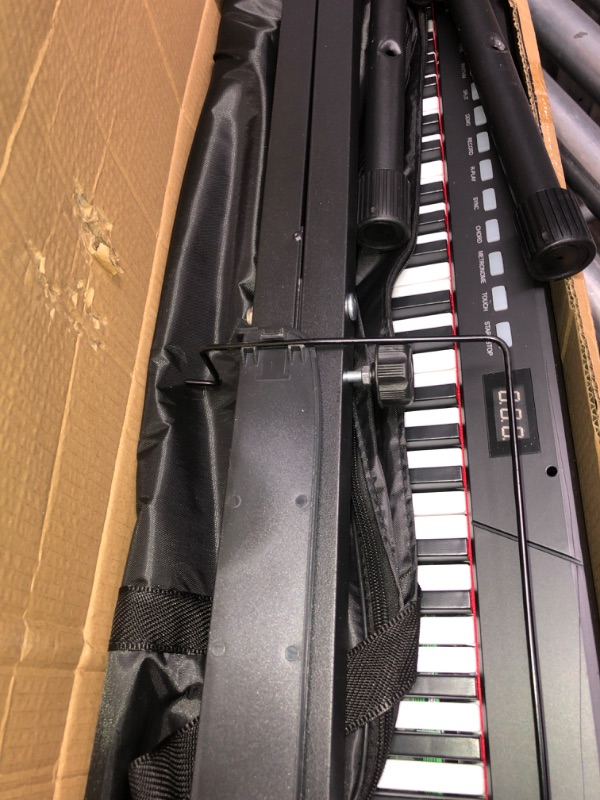 Photo 3 of Starfavor Semi-weighted Piano Keyboard 88 Keys with Stand, Sustain Pedal, and Carrying Case, SEK-88A