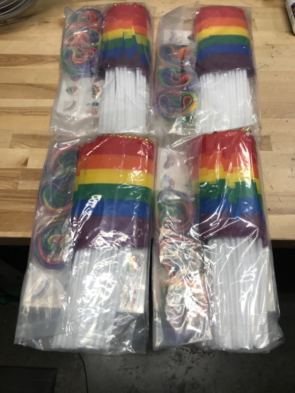 Photo 2 of ADXCO 144 Pieces Gay Pride Accessories Set Include 36 Mini Pride Flags 36 Wristbands, 72 Pieces Pride Temporary Tattoos Rainbow LGBTQ Flag Bracelets Stickers for Gay Pride Month Parade Themed Party 4 pack 