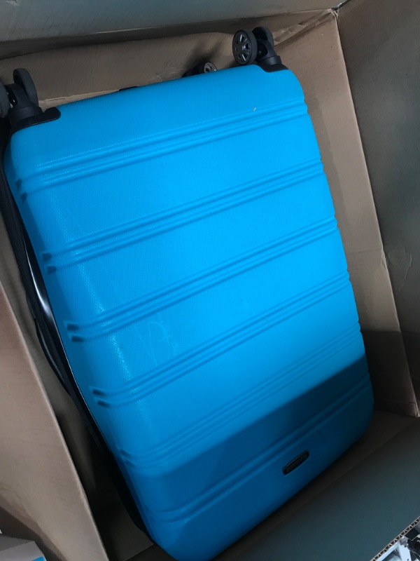 Photo 1 of **MINOR WEAR & TEAR**GENERIC BLUE SUITCASE