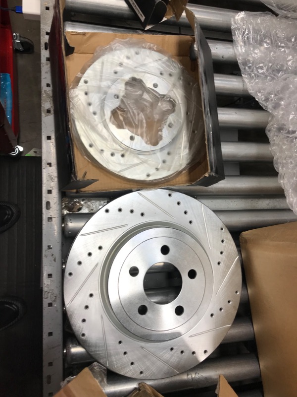 Photo 2 of Dynamic Friction Company Front Brake Rotors-Drilled and Slotted-Silver with 3000 Series Ceramic Brake Pads includes Hardware 7312-59032