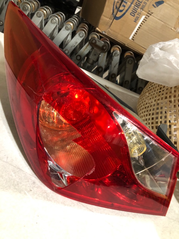 Photo 2 of * damaged * sold for parts * see images * 
TYC Left Tail Light Assembly Compatible with 2011-2014 Hyundai Sonata Driver Side