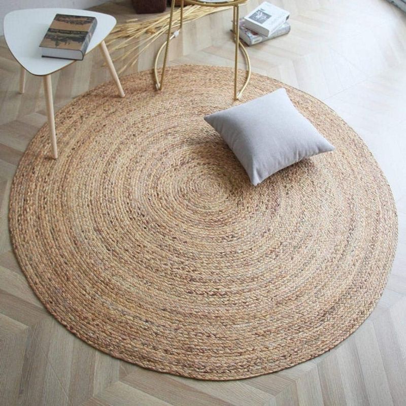 Photo 1 of  Handwoven Jute Area Rug - 3 feet Round - Natural Yarn - Rustic Vintage Beige Braided Reversible Rug - Eco Friendly Rugs for Bedroom - Kitchen - Living Room - Farmhouse (3' Round)