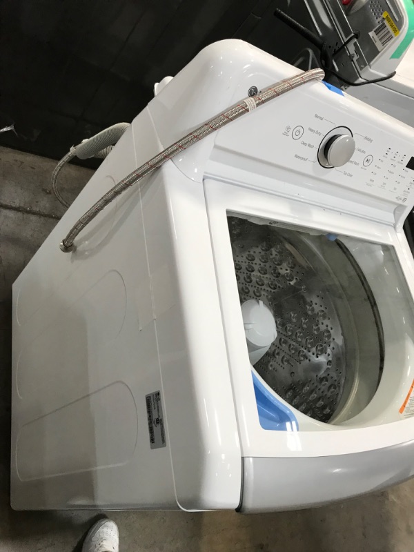 Photo 6 of LG 4.8-cu ft High Efficiency Agitator Top-Load Washer (White) ENERGY STAR