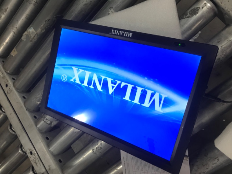 Photo 2 of Milanix 14.1" Portable Widescreen LED TV with HDMI VGA MMC FM Usb/sd Card Slot Built in Digital Tuner AV Inputs and Remote Control