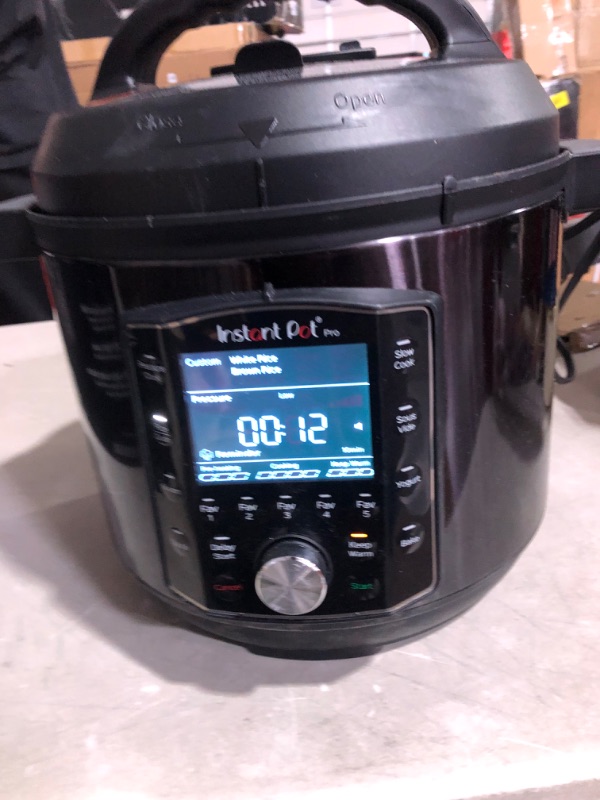 Photo 5 of (USED AND MISSING PRESSURE PIPES) Instant Pot Pro 10-in-1 Pressure Cooker, Slow Cooker, Rice/Grain Cooker, Steamer, Sauté, Sous Vide, Yogurt Maker, Sterilizer, and Warmer, Includes App With Over 800 Recipes, Black, 8 Quart 8QT Pro