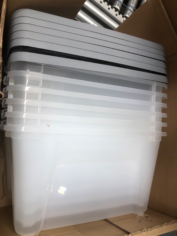 Photo 2 of **MINOR CRACKS** Amazon Basics 32 Quart Stackable Plastic Storage Bin with Latching Lid- Clear/ Grey- Pack of 6 32 Qt. - 6 Pack