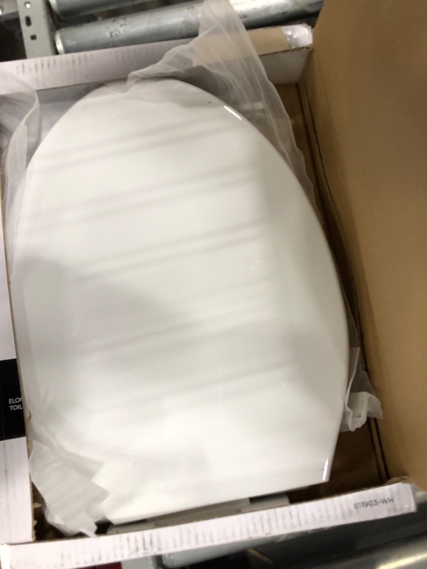 Photo 4 of ***HINGE DAMAGED - SEE NOTES***
Delta -Faucet Morgan Elongated Slow-Close White Toilet Seat with Non-Slip Seat Bumpers 811903-WH 